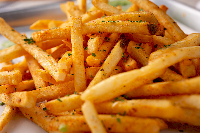 Acrylamide is produced during the preparation of certain foods such as french fries and is considered as probably carcinogenic to humans. However, its levels have been reduced with the help of food chemistry.